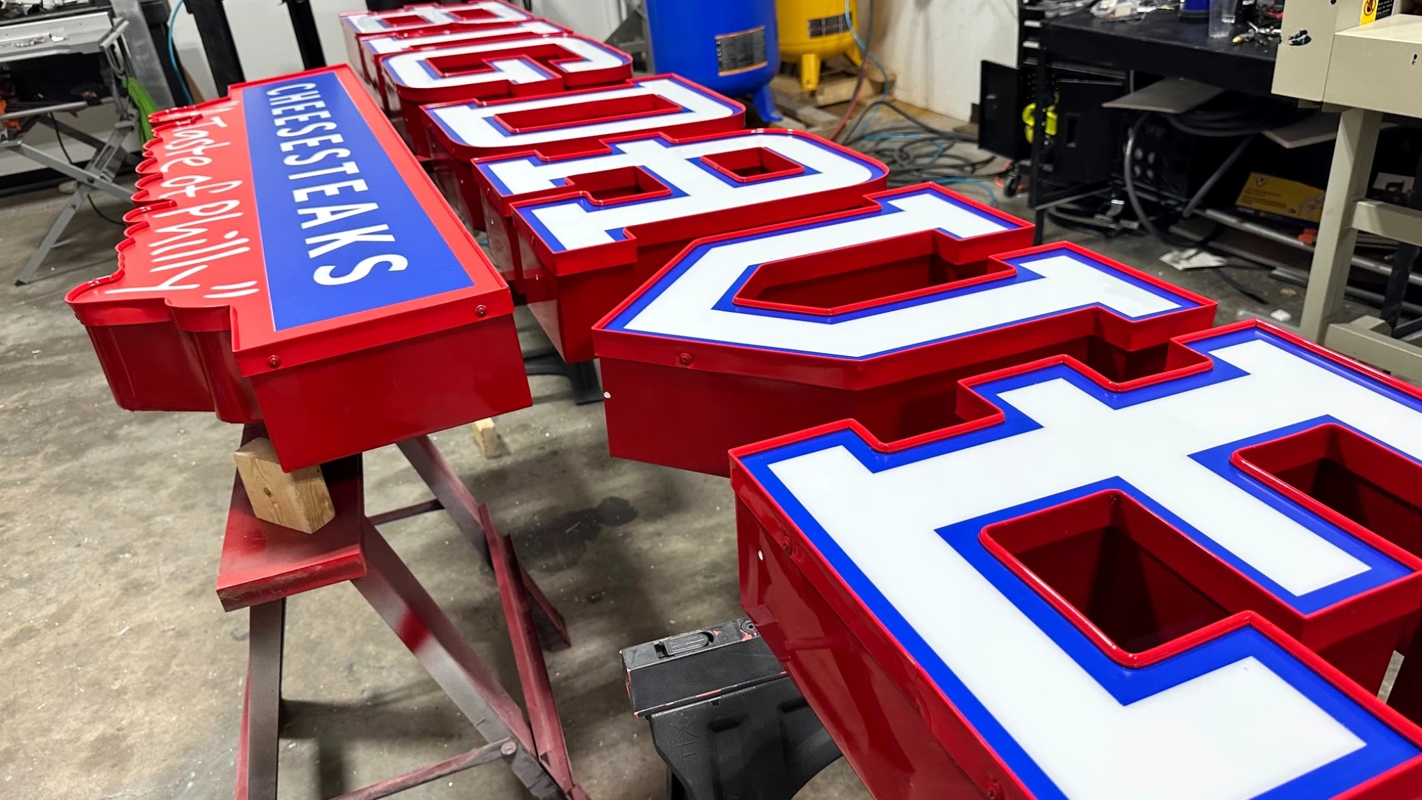 Dimensional illuminated commercial sign letters during fabrication